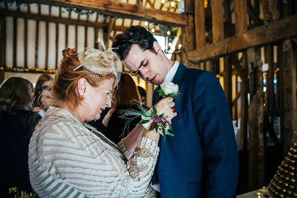 Autumn barn wedding at Crondon Park with rich reds and an ethereal Pronovias gown with Game of Throne vibes! Essex Documentary Wedding Photographer