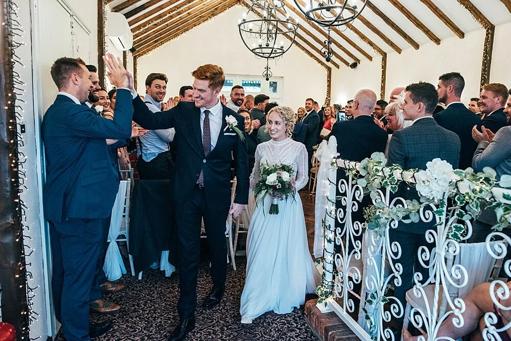 Autumn barn wedding at Crondon Park with rich reds and an ethereal Pronovias gown with Game of Throne vibes! Essex Documentary Wedding Photographer