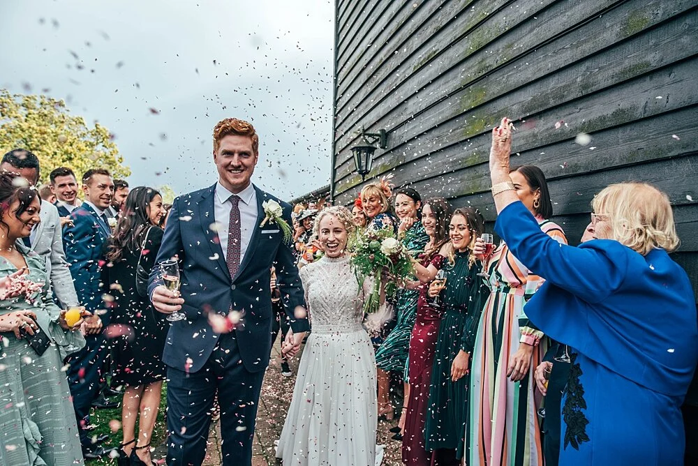 Autumn barn wedding at Crondon Park with rich reds and an ethereal Pronovias gown with Game of Throne vibes! Essex Documentary Wedding Photographer