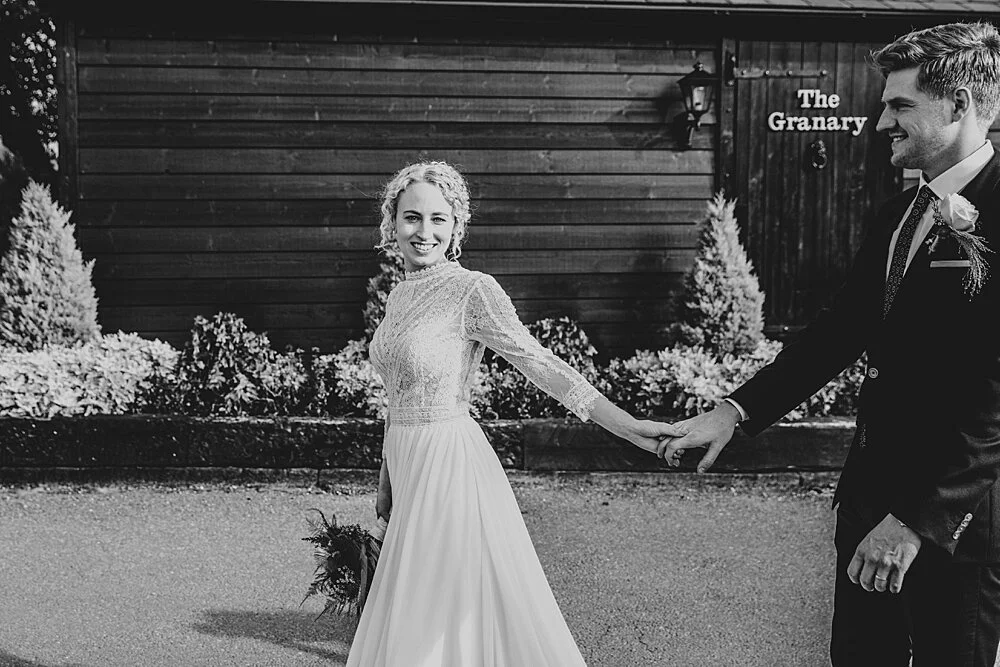 Autumn barn wedding at Crondon Park with rich reds and an ethereal Pronovias gown with Game of Throne vibes! Essex Documentary Wedding Photographer