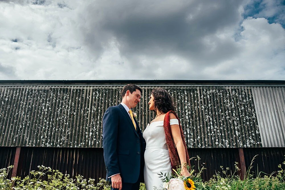 Summer brights for intimate farm wedding The Barns at Lodge Farm Essex Documentary Wedding Photographer