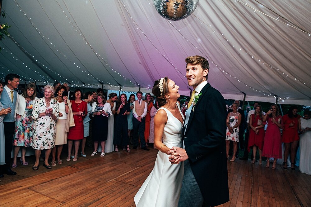 English country garden marquee wedding with Summer Pastels, Smokebombs, Hanging Flower Installation. Food by Gather &amp; Feast . Essex Documentary Wedding Photographer