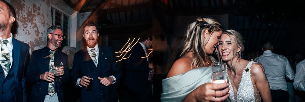 A festival inspired barn venue with lush tropical foliage &amp; greenery leading the styling at Henham Weddings. Essex documentary wedding photographer.