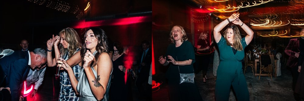 Dark Autumn Luxe with Reds, Navy's and Silvers, oversized bouquets &amp; an explosion of seasonal flora &amp; fauna for this Lodge Barn Farm wedding. Essex Documentary Wedding Photographer.