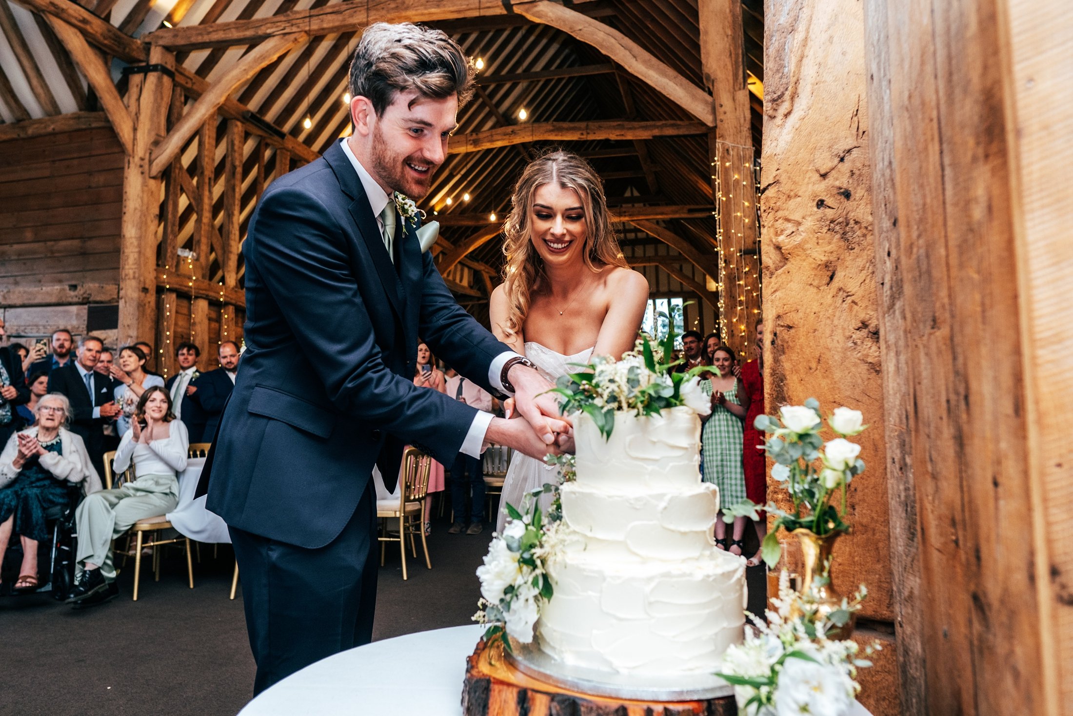 A perfect mid-summer wedding at blake hall with a palette of muted greesn and neutrals. Bride showcases two willowby by watters dresses.        essex documentary wedding photographer