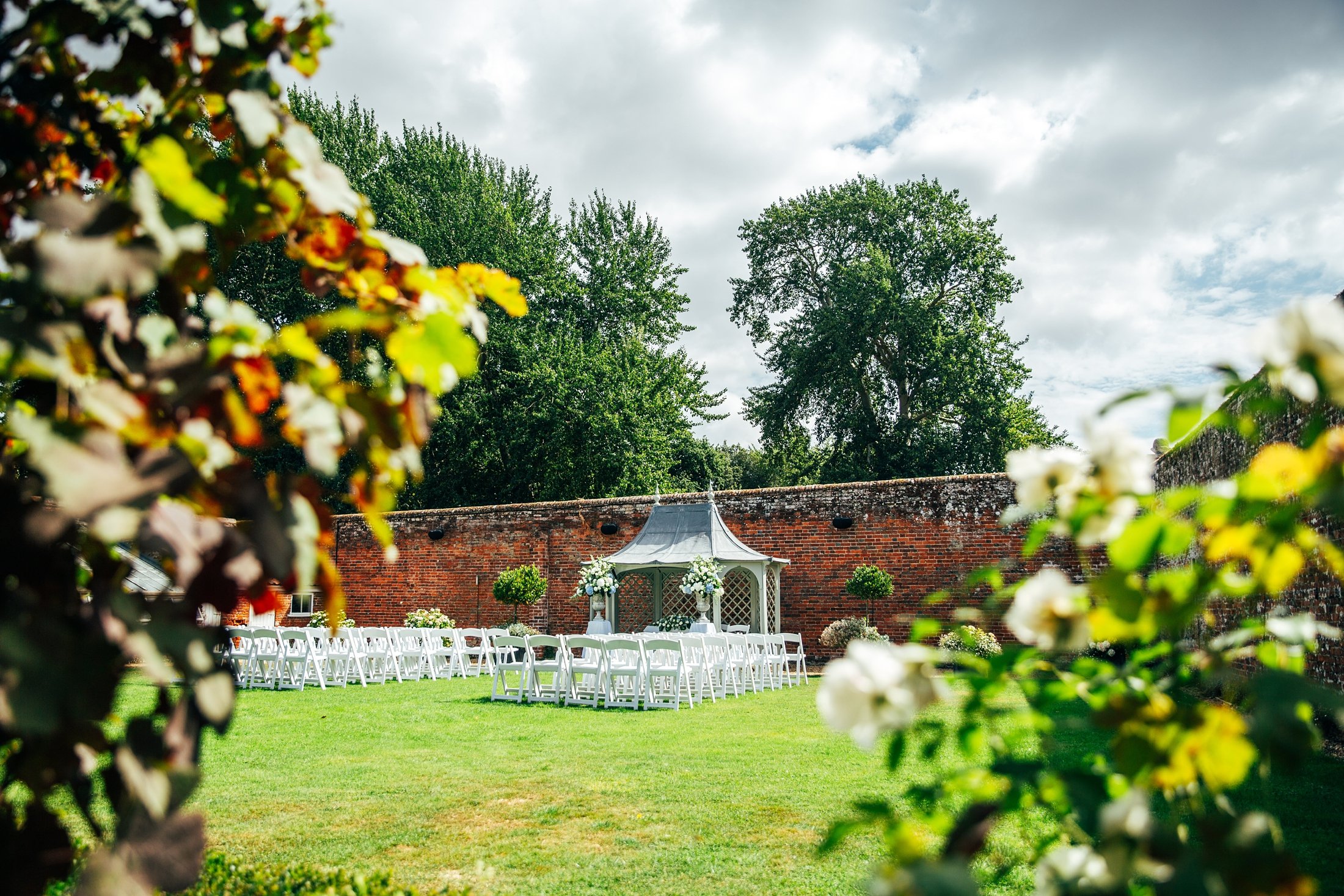 Late summer sunset, Blues &amp; Whites, doggy guest of honour, a pantomime dame and epic dance routines for this Braxted Park wedding. Essex documentary wedding photographer