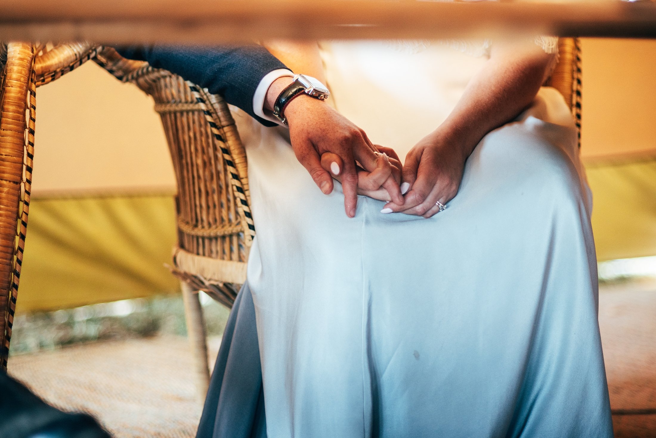 A boho, summer brights, back garden tipi wedding featuring a dip dye dress, flower crowns, hay bales, a lawn mower entrance and Italian sharing boards. Essex documentary wedding photographer