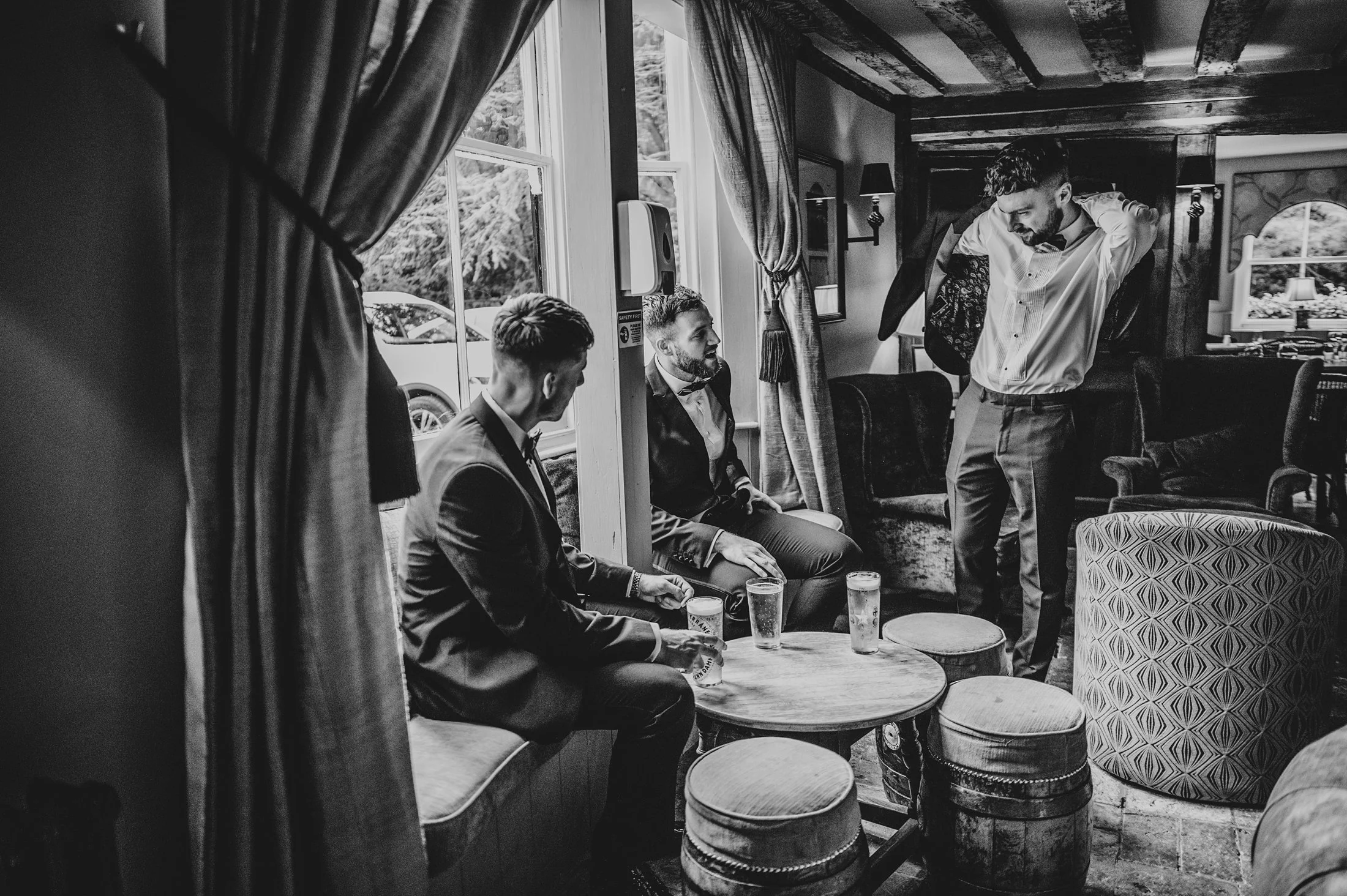Delicate sage &amp; white paired with black tie for an early Autumn barn wedding at The White Hart, Great Yeldham. Essex documentary wedding photographer