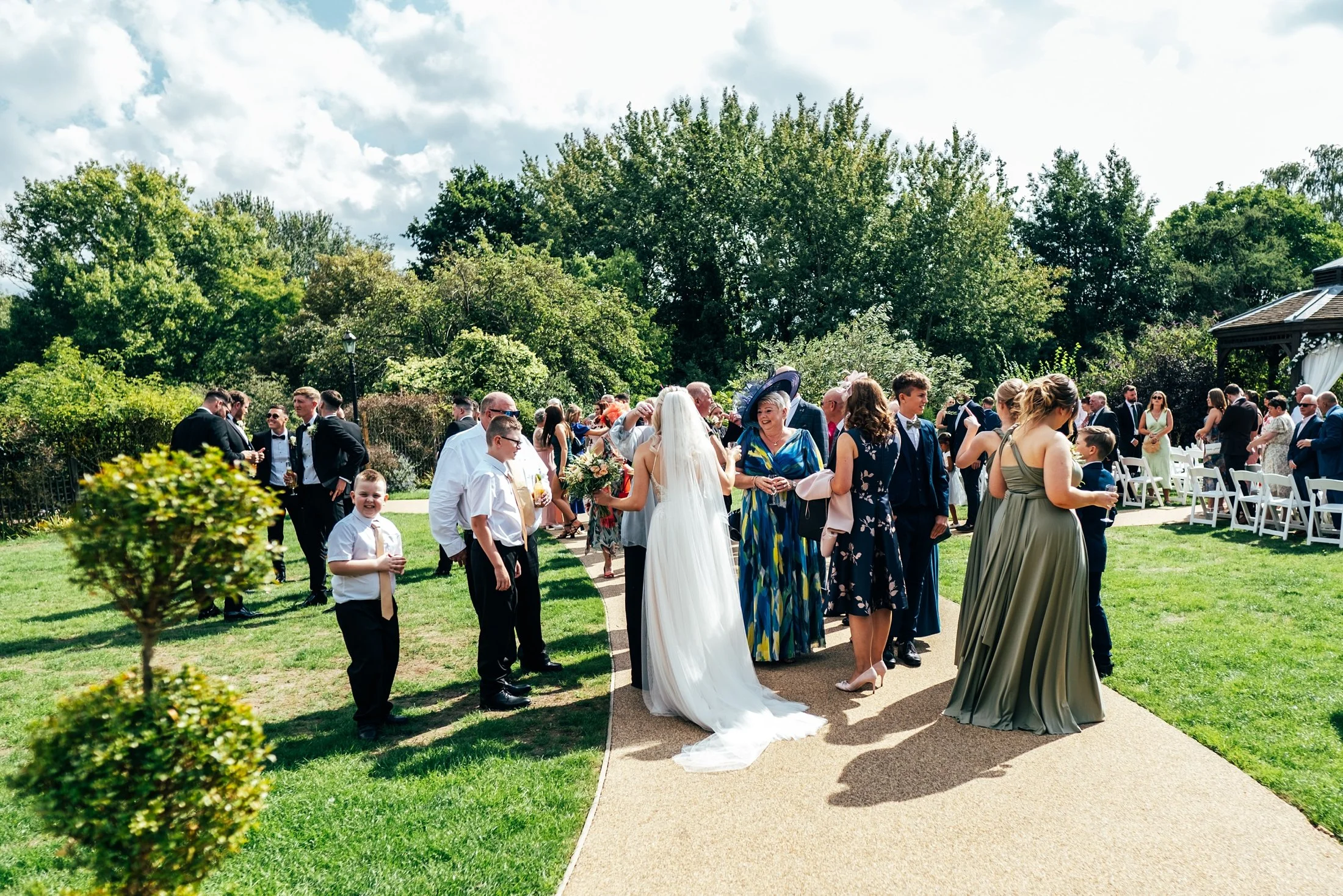Delicate sage &amp; white paired with black tie for an early Autumn barn wedding at The White Hart, Great Yeldham. Essex documentary wedding photographer
