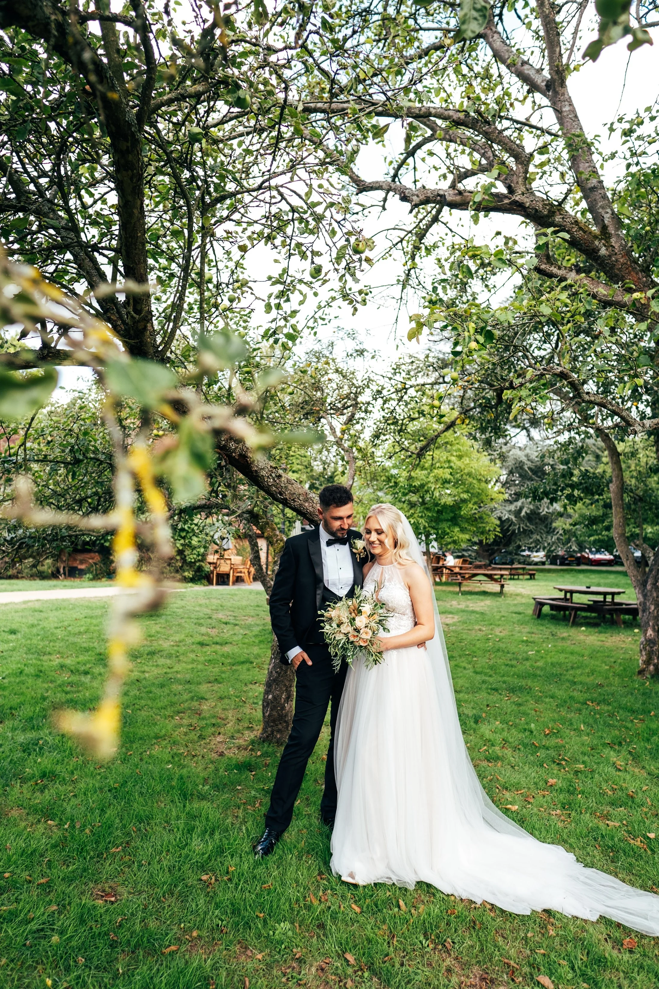 Delicate sage &amp; white paired with black tie for an early Autumn barn wedding at The White Hart, Great Yeldham. Essex documentary wedding photographer