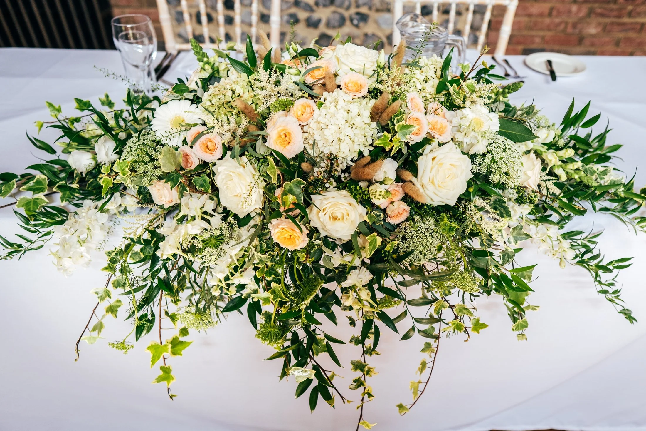 Delicate sage &amp; white paired with black tie for an early Autumn barn wedding at The White Hart, Great Yeldham. Essex documentary wedding photographer