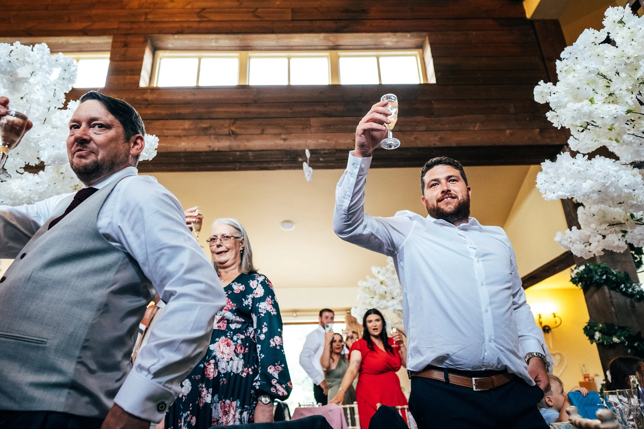 Delicate sage &amp; white paired with black tie for an early Autumn barn wedding at The White Hart, Great Yeldham. Essex documentary wedding photographer