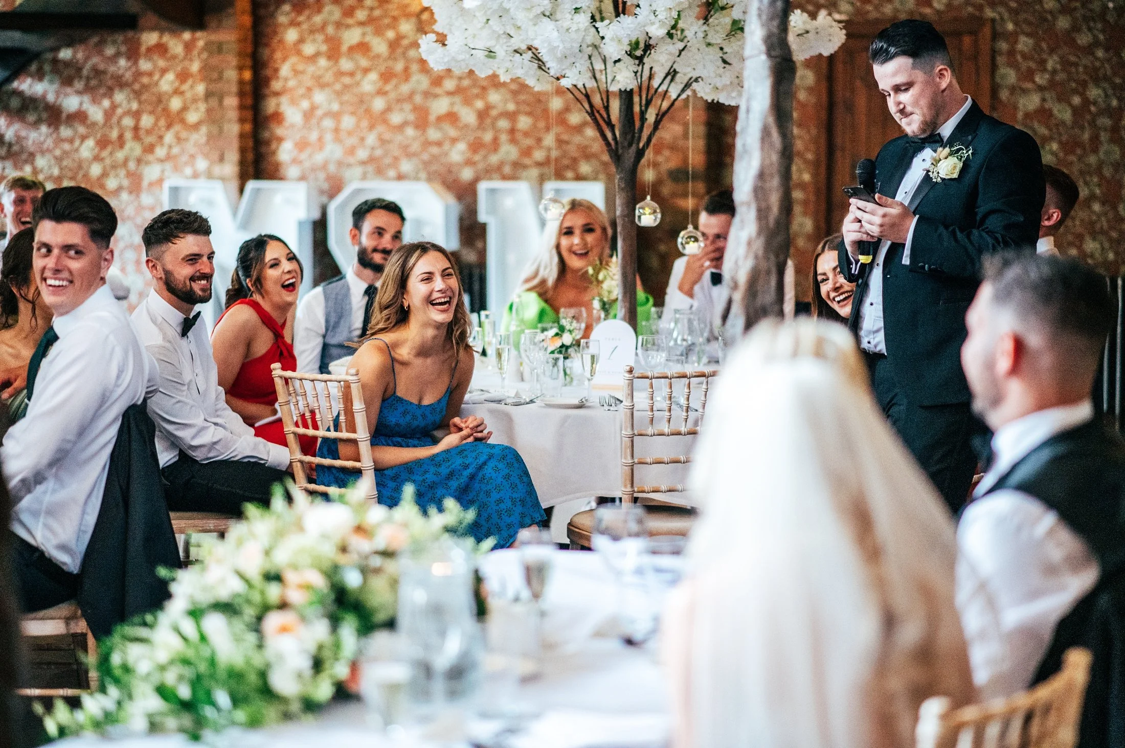 Delicate sage &amp; white paired with black tie for an early Autumn barn wedding at The White Hart, Great Yeldham. Essex documentary wedding photographer