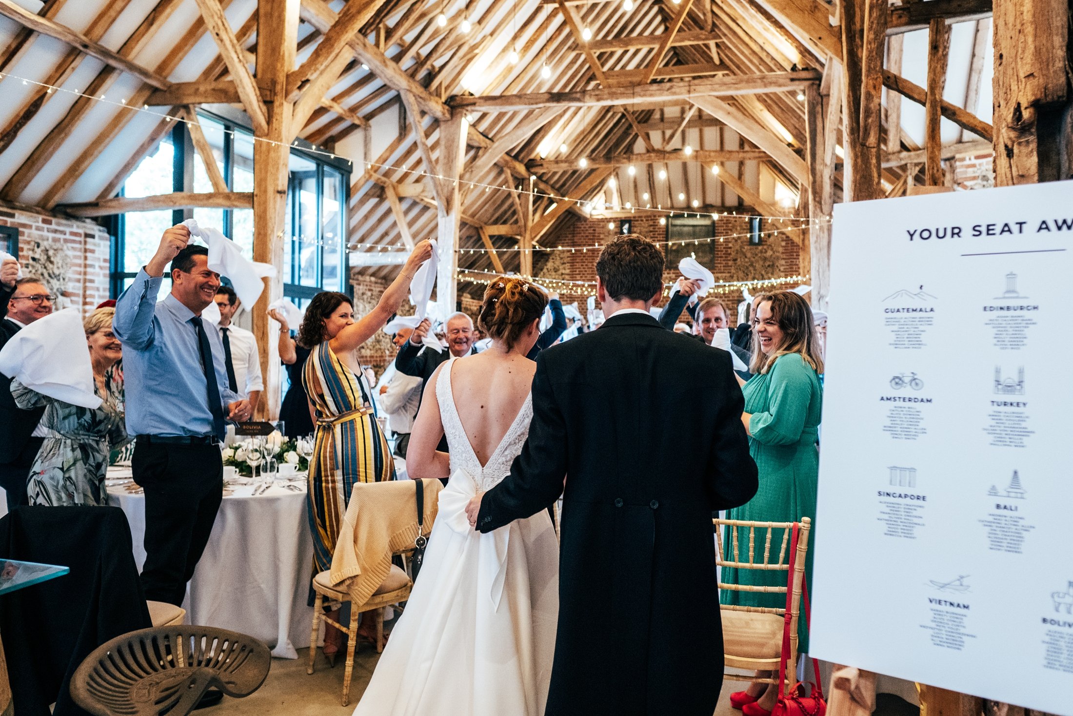Blues &amp; thistles for a travel inspired autumn church &amp; vineyard wedding at Tuffon Hall. Essex documentary wedding photographer