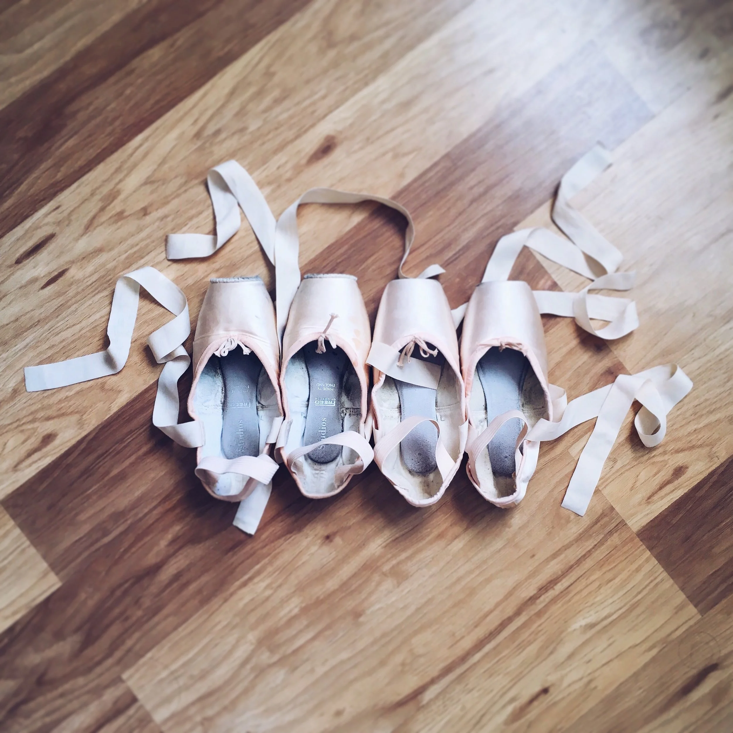 Solo Artist Stephanie Joe explains: "Here you can see two different pointe shoe brands I've been wearing - the shoes on the left have darning around the edge of the platform, and the shoes on the right are new and haven't been darned yet!"