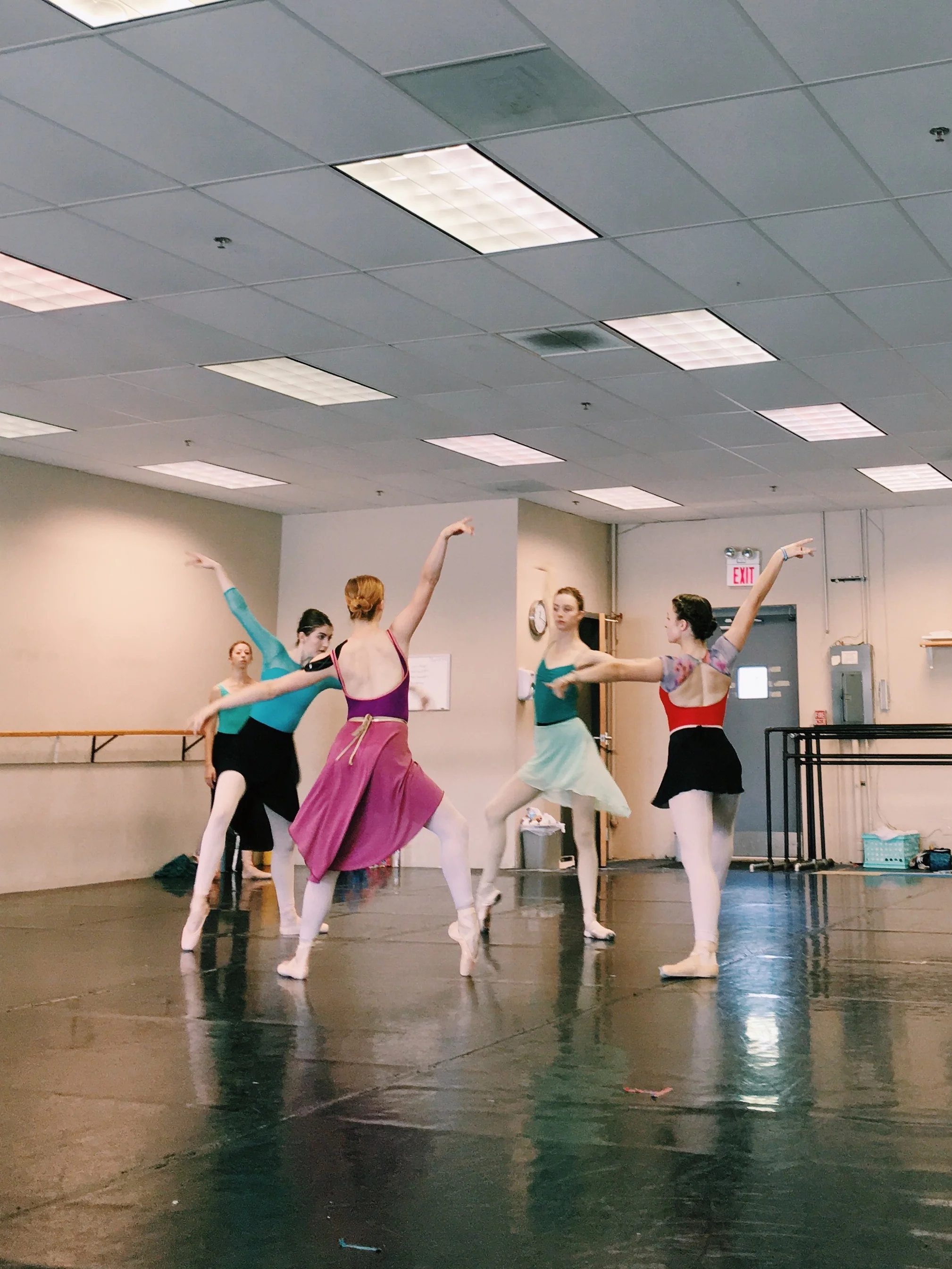 Senior Apprentice Laura Peterman and artists of the company rehearsing culture one in All God's Children .