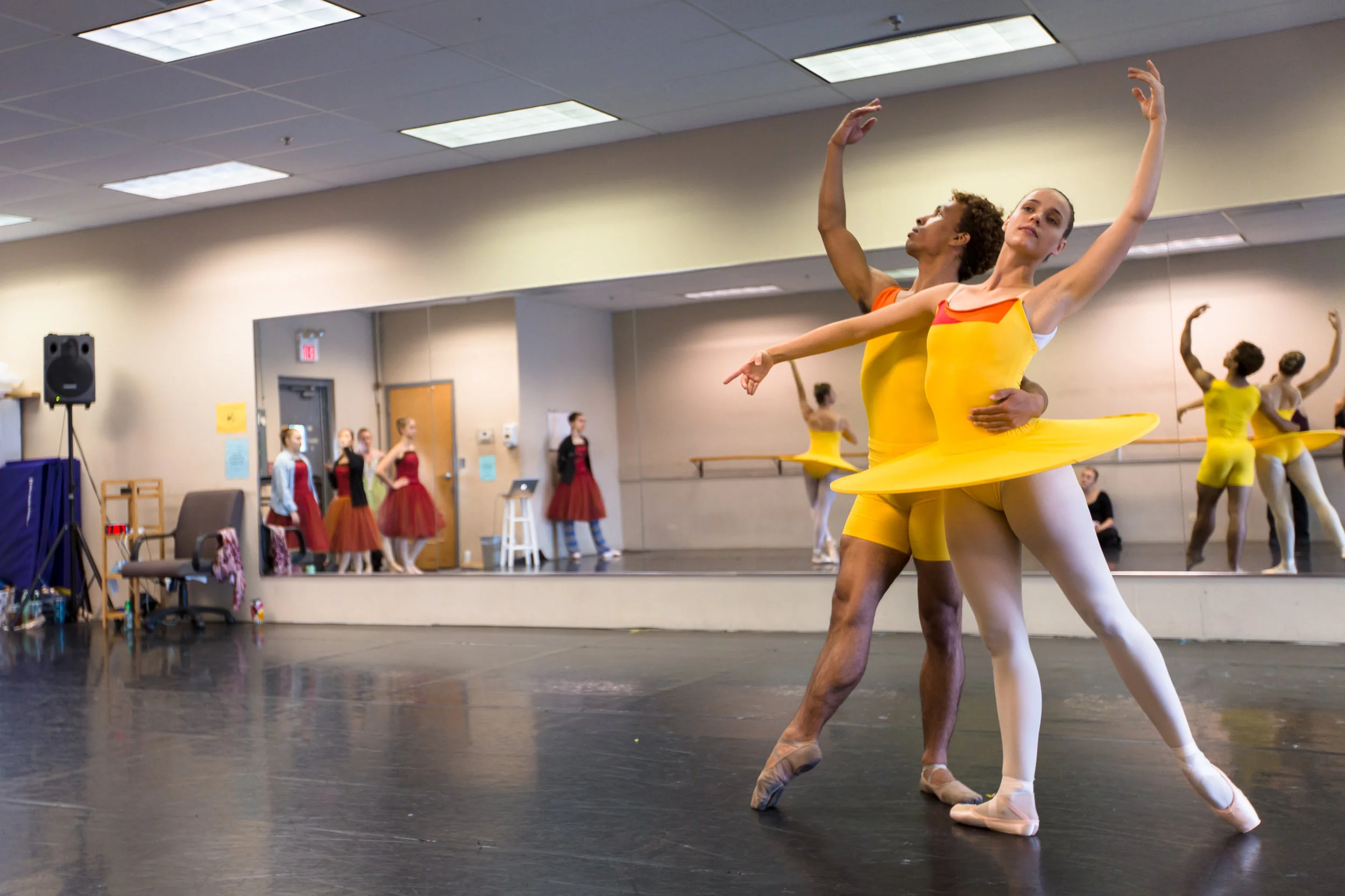 Lead artists brette benedict and antonio rosario rehearsing the summmer pas de deux from four seasons of the soul .