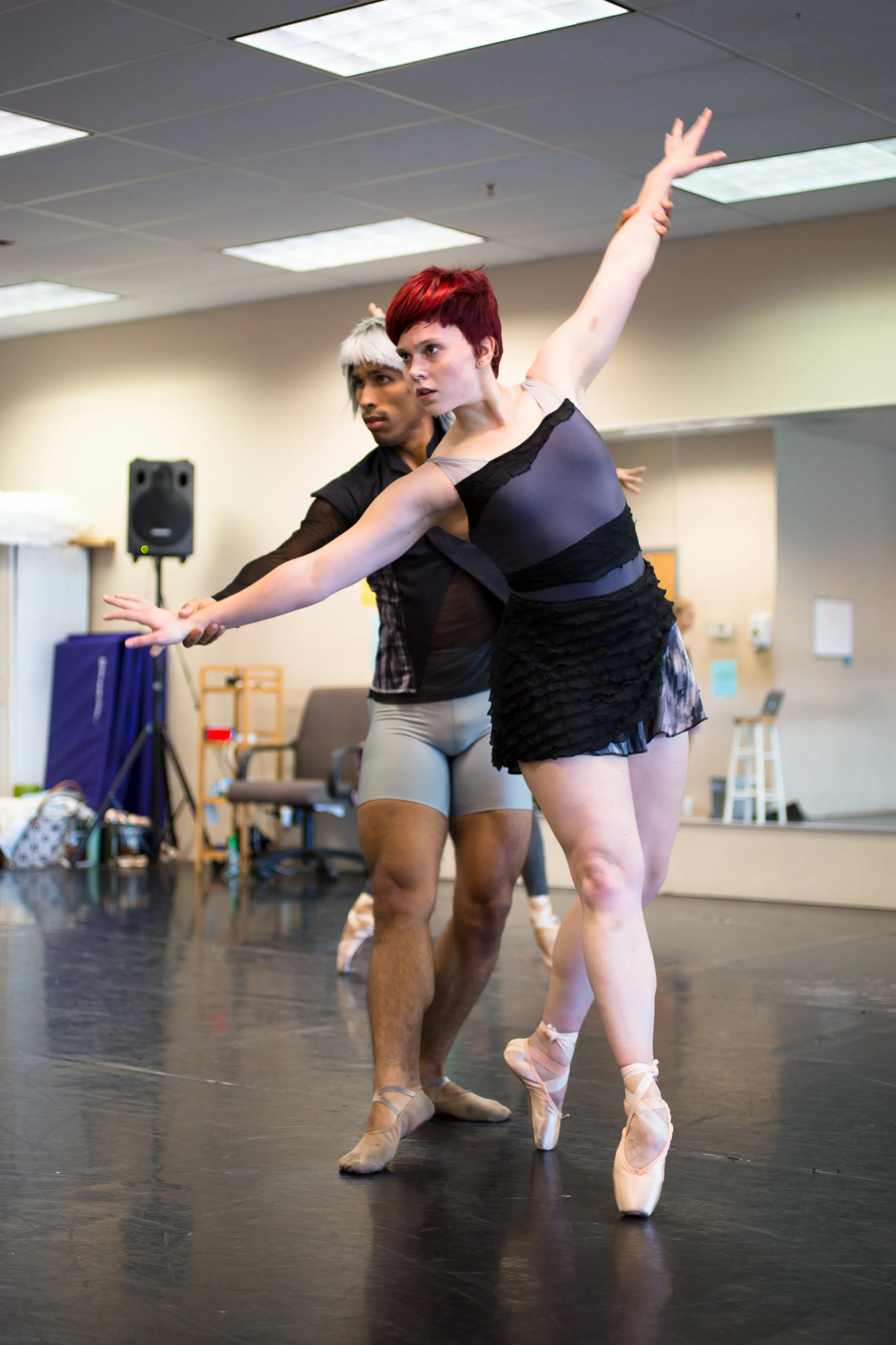 Company Artist Emily Ratkos in rehearsal for the Grey Town movement from The Space in Between .