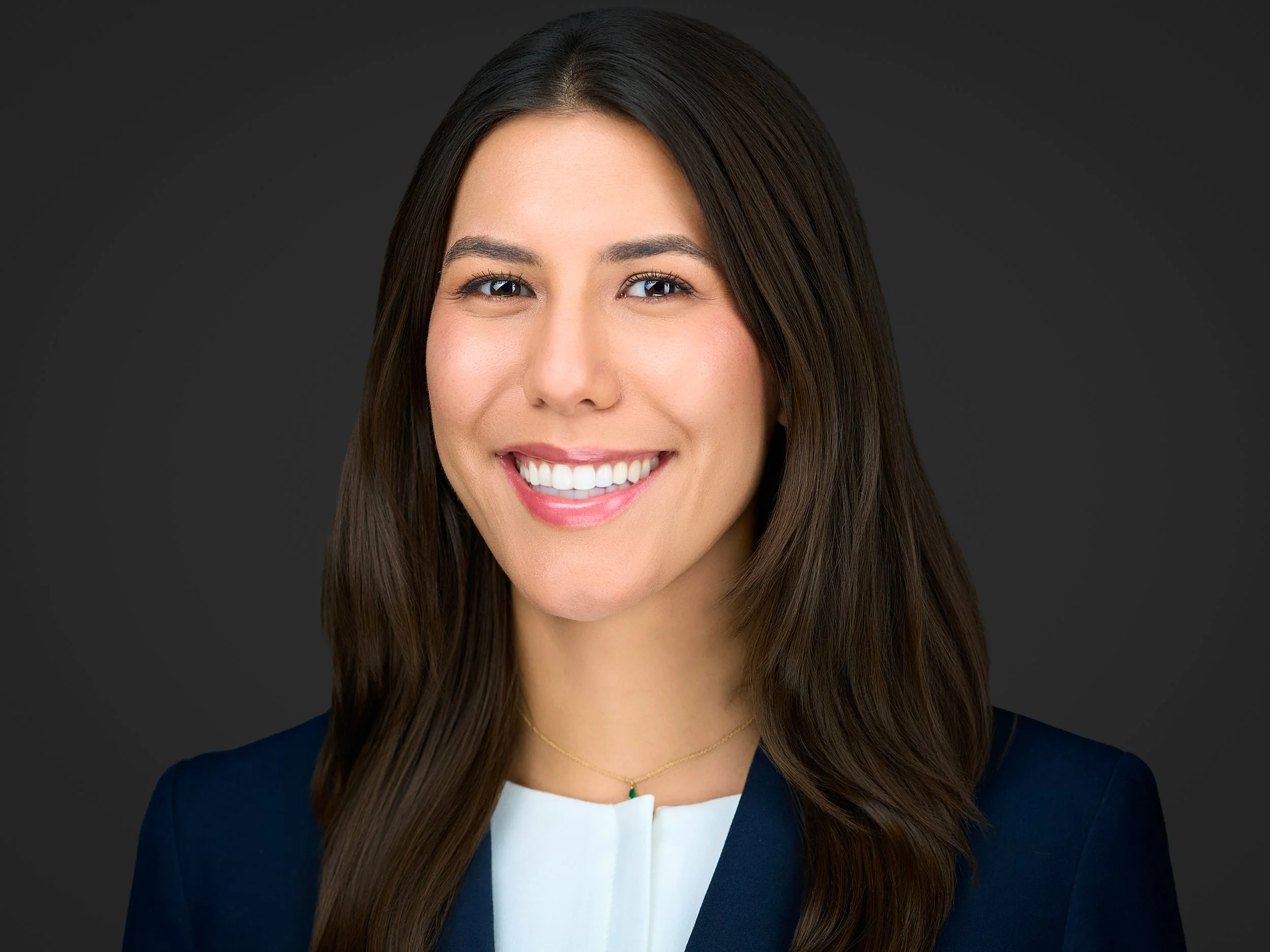 Professional headshot of a Tallahassee Electronic Residency Application Service (ERAS) applicant in a white blouse and blue jacket by Robert Hunter Photography