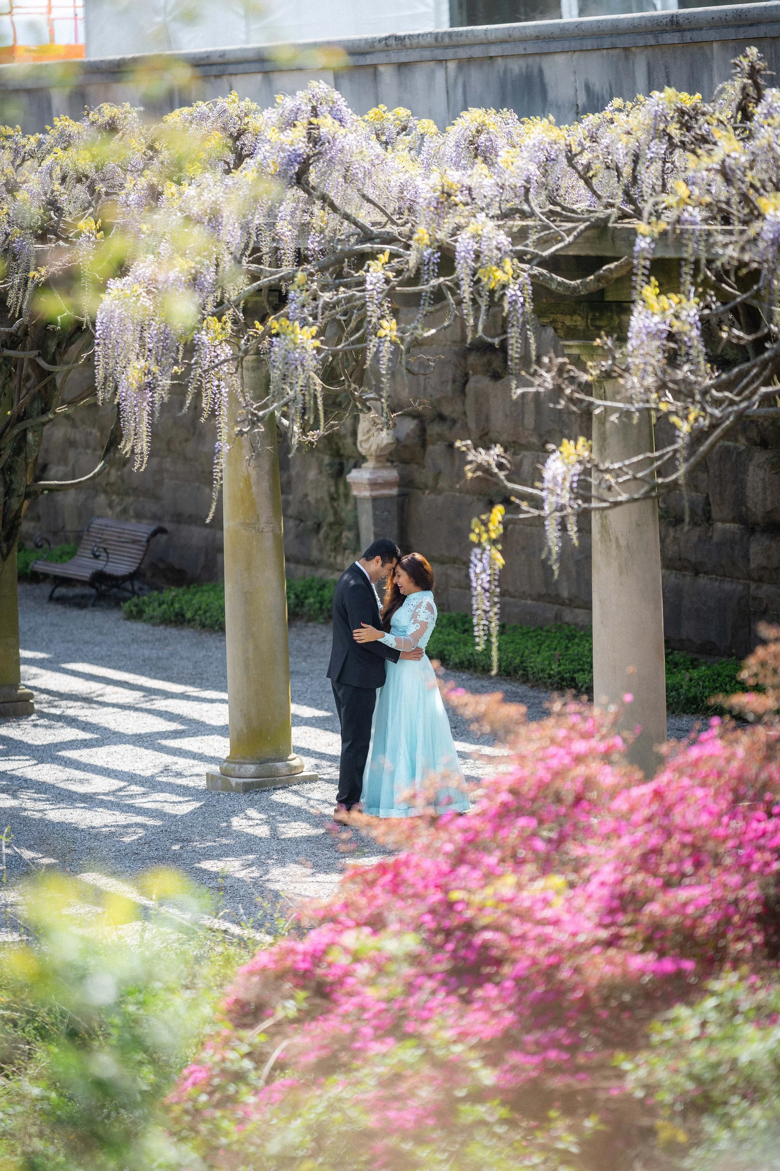 Couple during a photoshoot in the blooming gardens at the Biltmore Estate in Asheville, North Carolina.