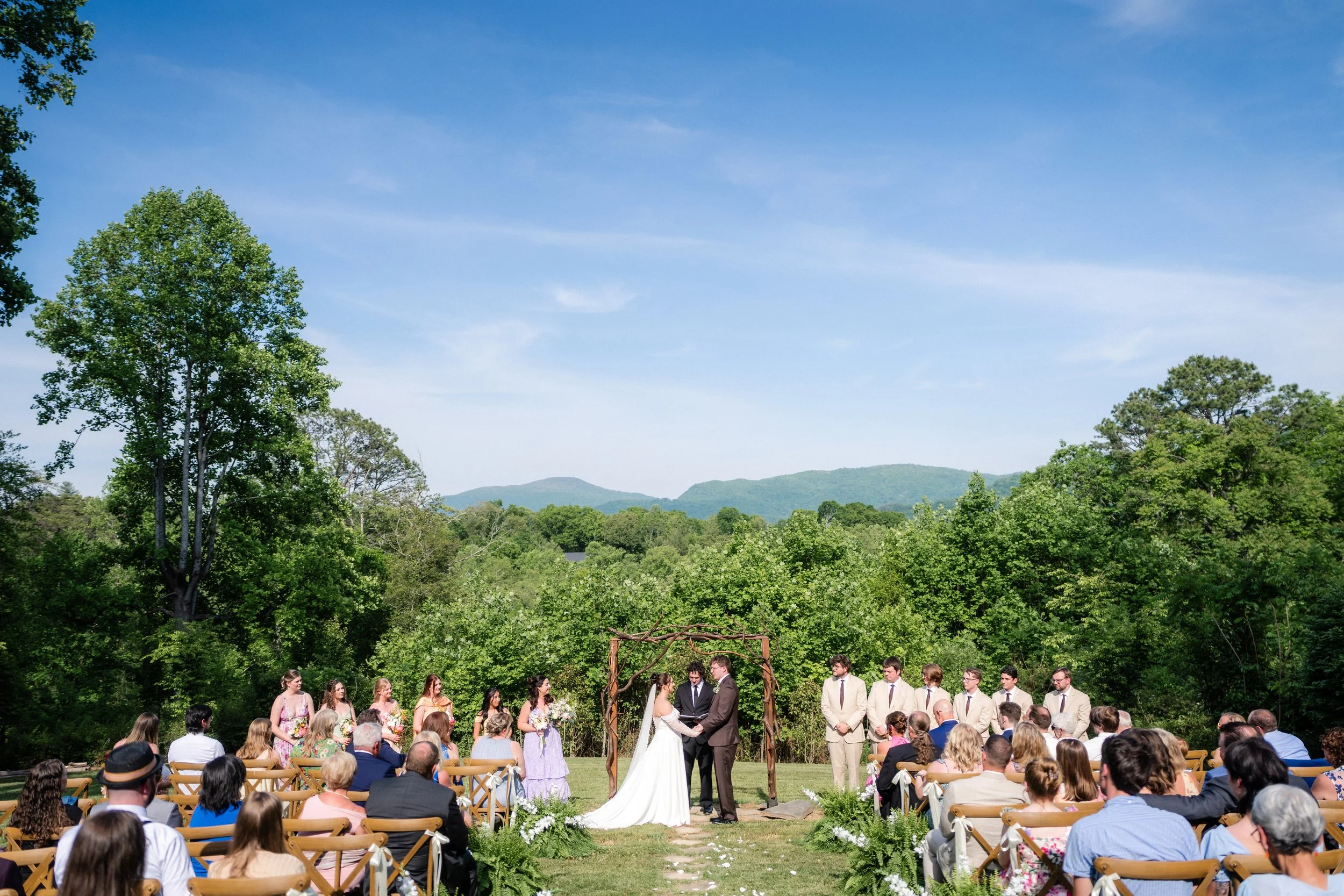 Outdoor wedding ceremony in Asheville following Hurricane Helene.