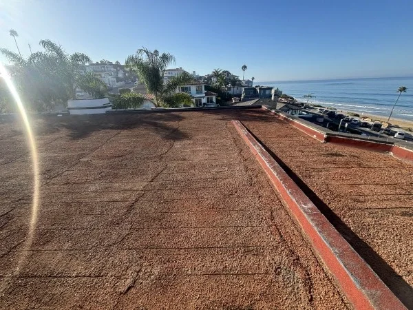 Flat commercial roof prepared for waterproof roofing system installation.