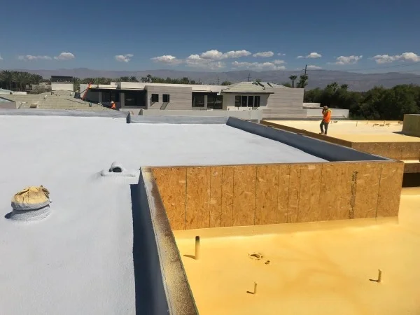 Spray foam and white coating applied during roof restoration