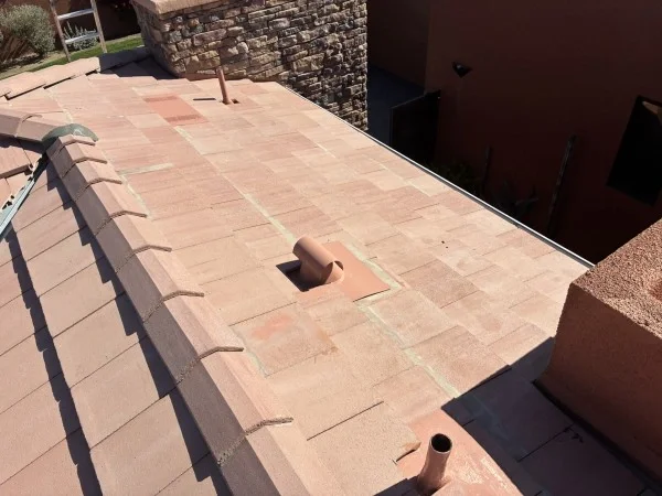 Low-slope tile roof section with completed underlayment installation