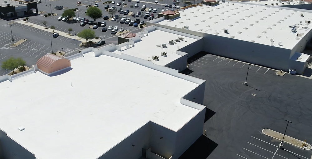Commercial building with spray foam art roof