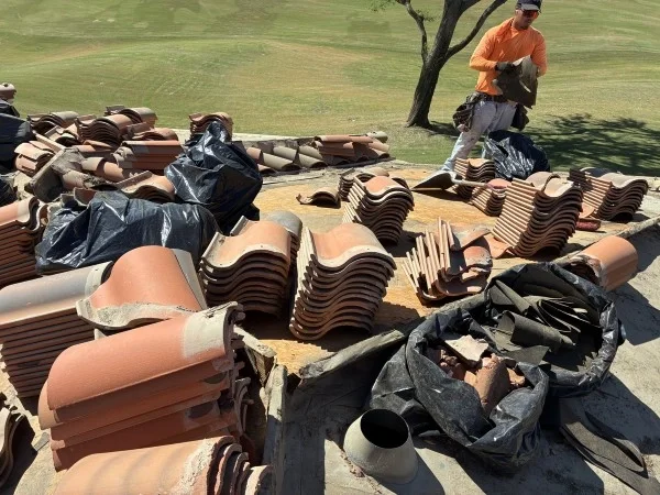 Staged clay roof tiles prepared for reinstallation project