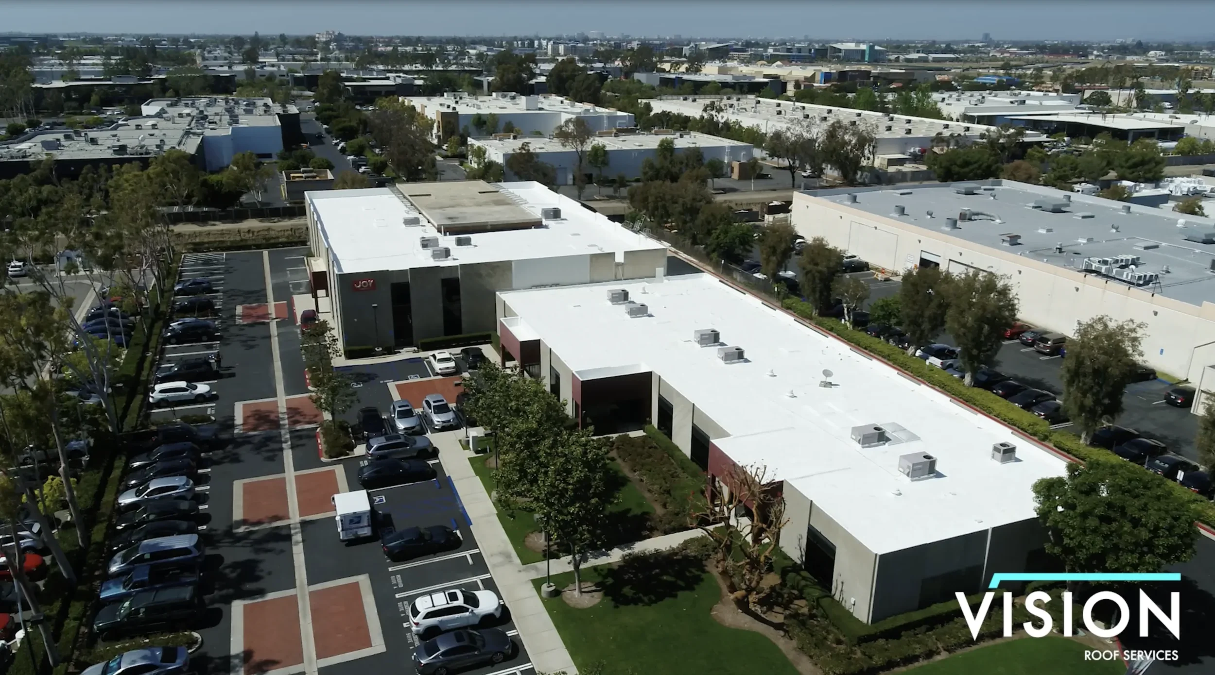 Commercial buildings with flat roofs in a service area