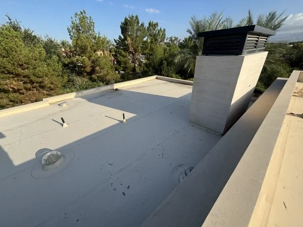 Residential flat roof surface before restoration and recoating