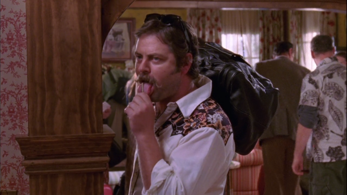*Licks his thumb and wipes it on Lorelai's shirt* "How about we get out of these wet clothes?"
