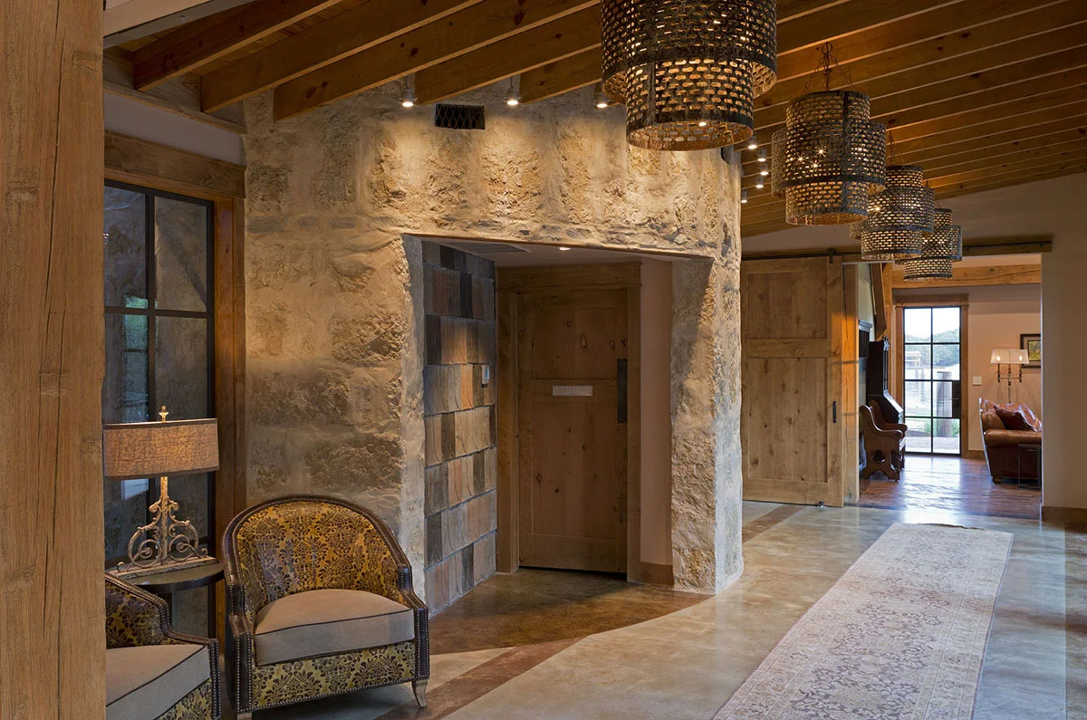 Connecting hallway between two barns, silo men's room at left - PB
