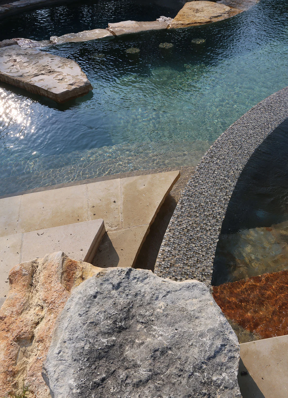 Detail at steps at intersection of kids pool and main pool - DH
