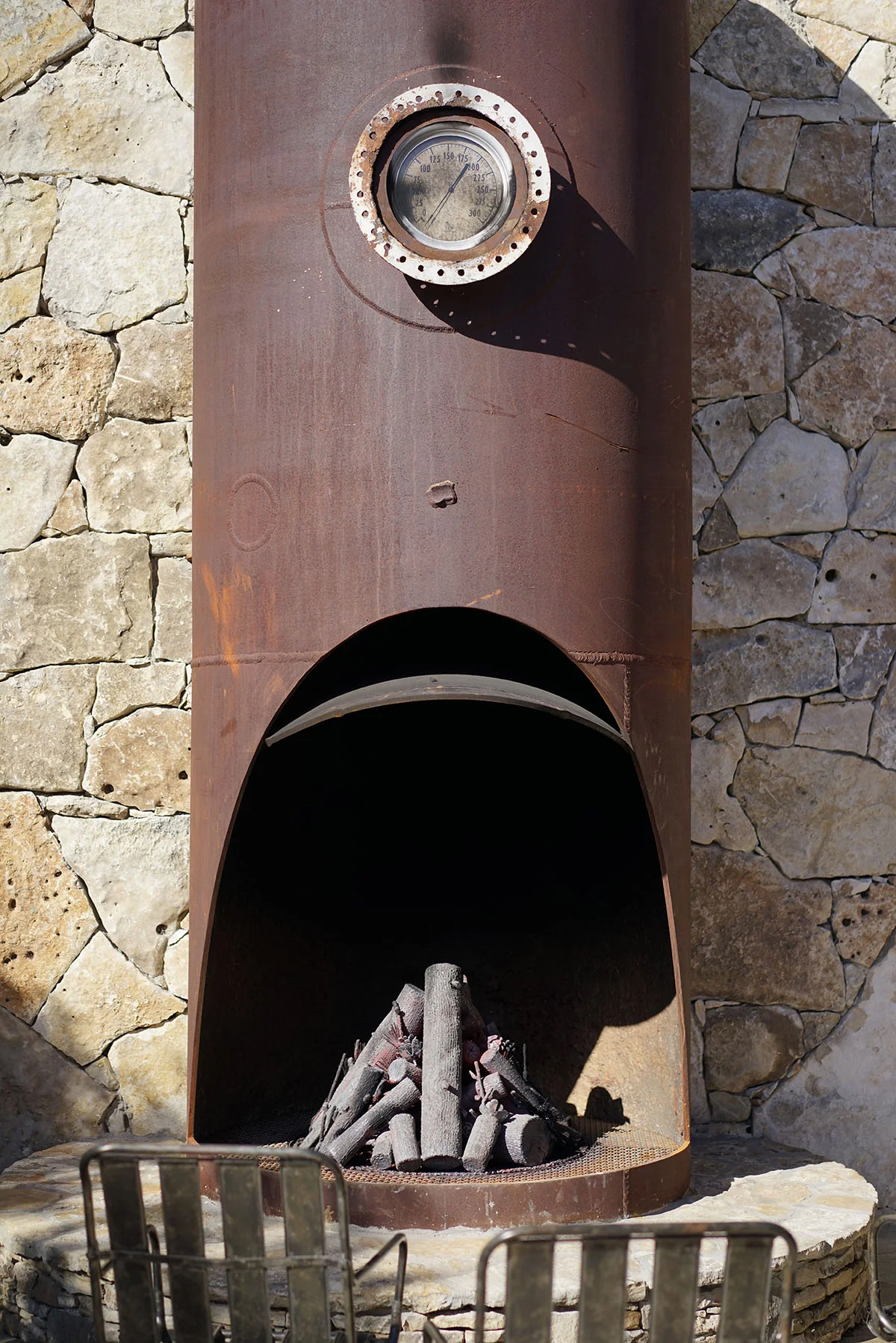 Fire pit fabricated using reclaimed metal propane tank - DH