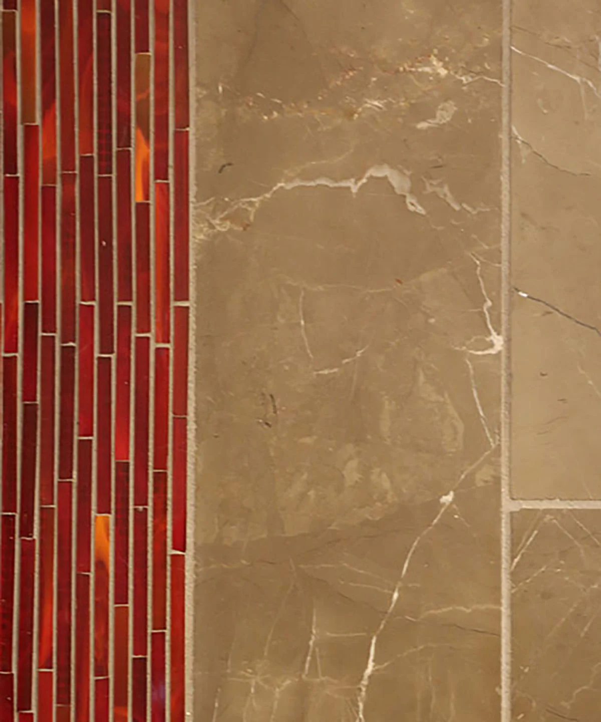 Sable marble tile and red glass mosaic tile