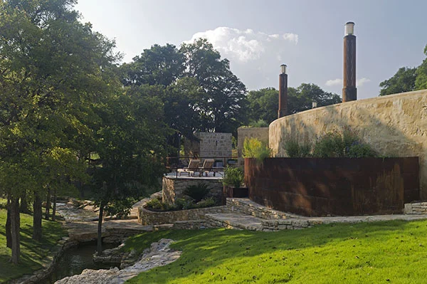 View of retaining walls/terraces below the Activiy Lawn and pool deck areas - PB