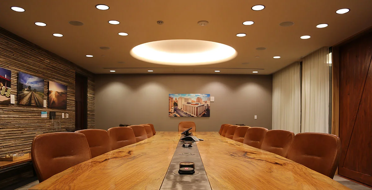 Custom live edge board room table with integrated technology