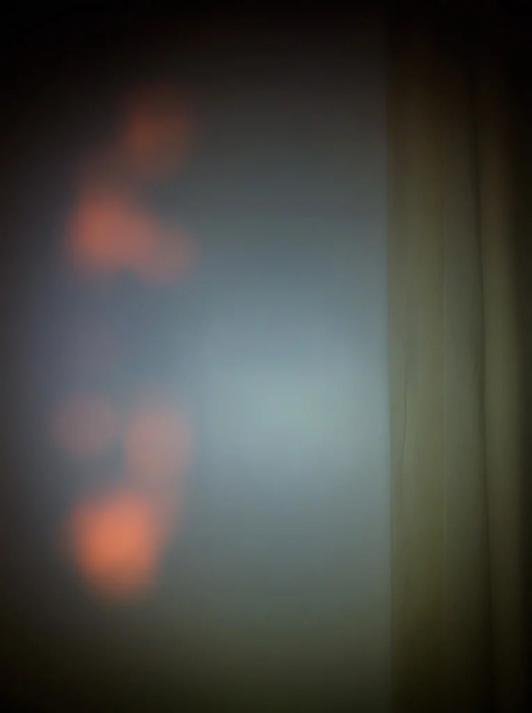 Untitled (family pictures); pink light