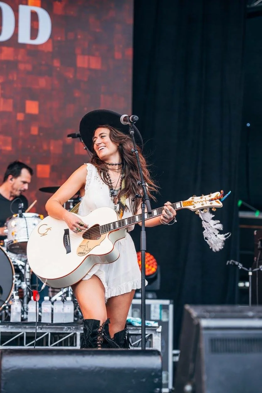 With my White Falcon Gretsch acoustic in Australia at CMC rocks.jpg