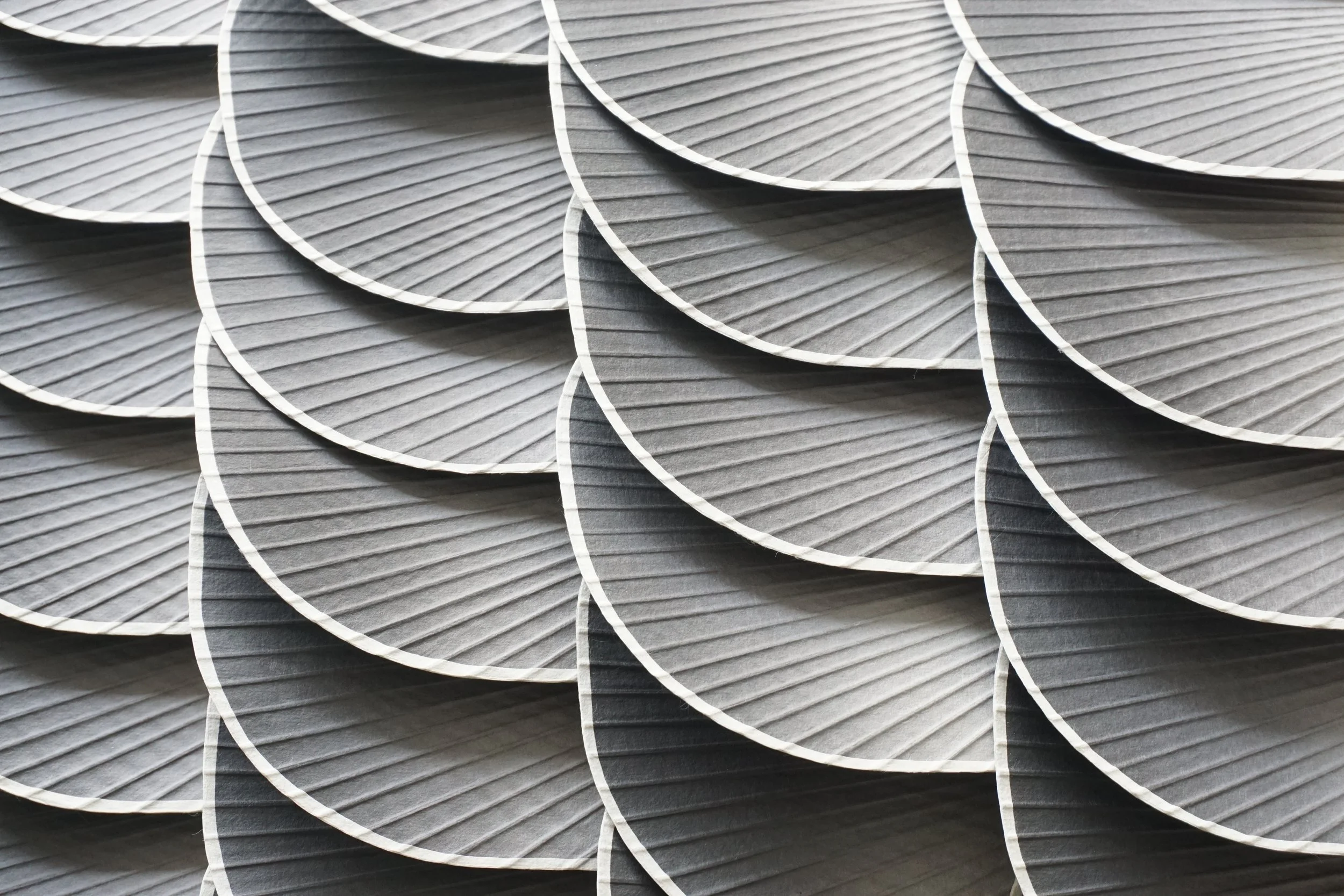 forest breeze monochrome fans laid out on top of each other
