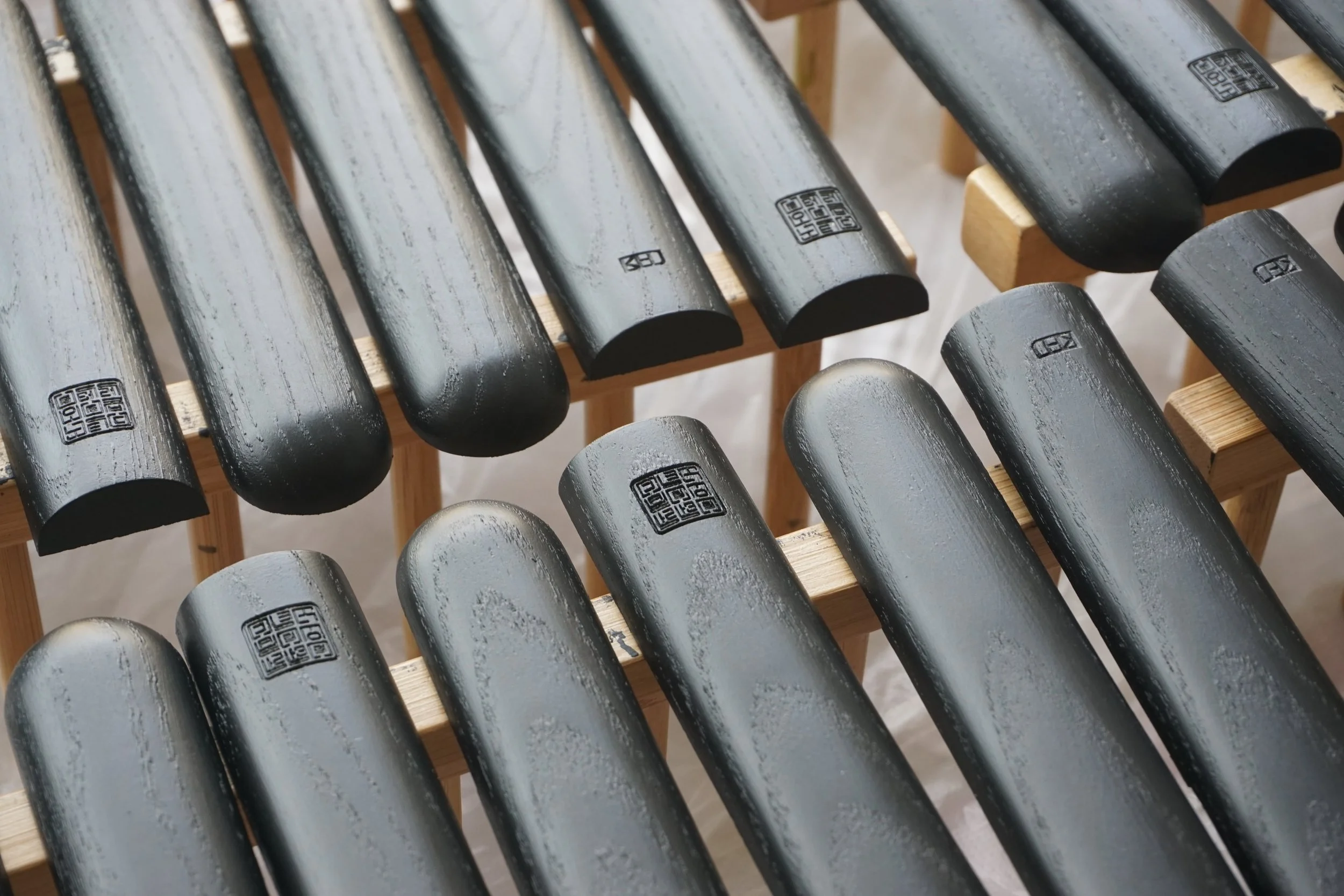 black fan handles with inscription