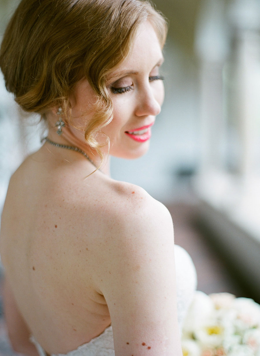 beautiful bride wearing vintage earrings at Villa Terrace