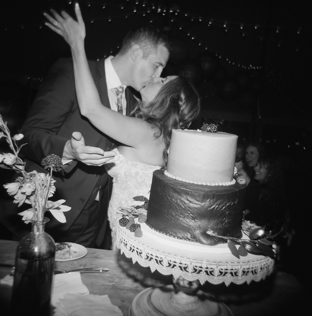 door county weddings black and white cake cutting film photography