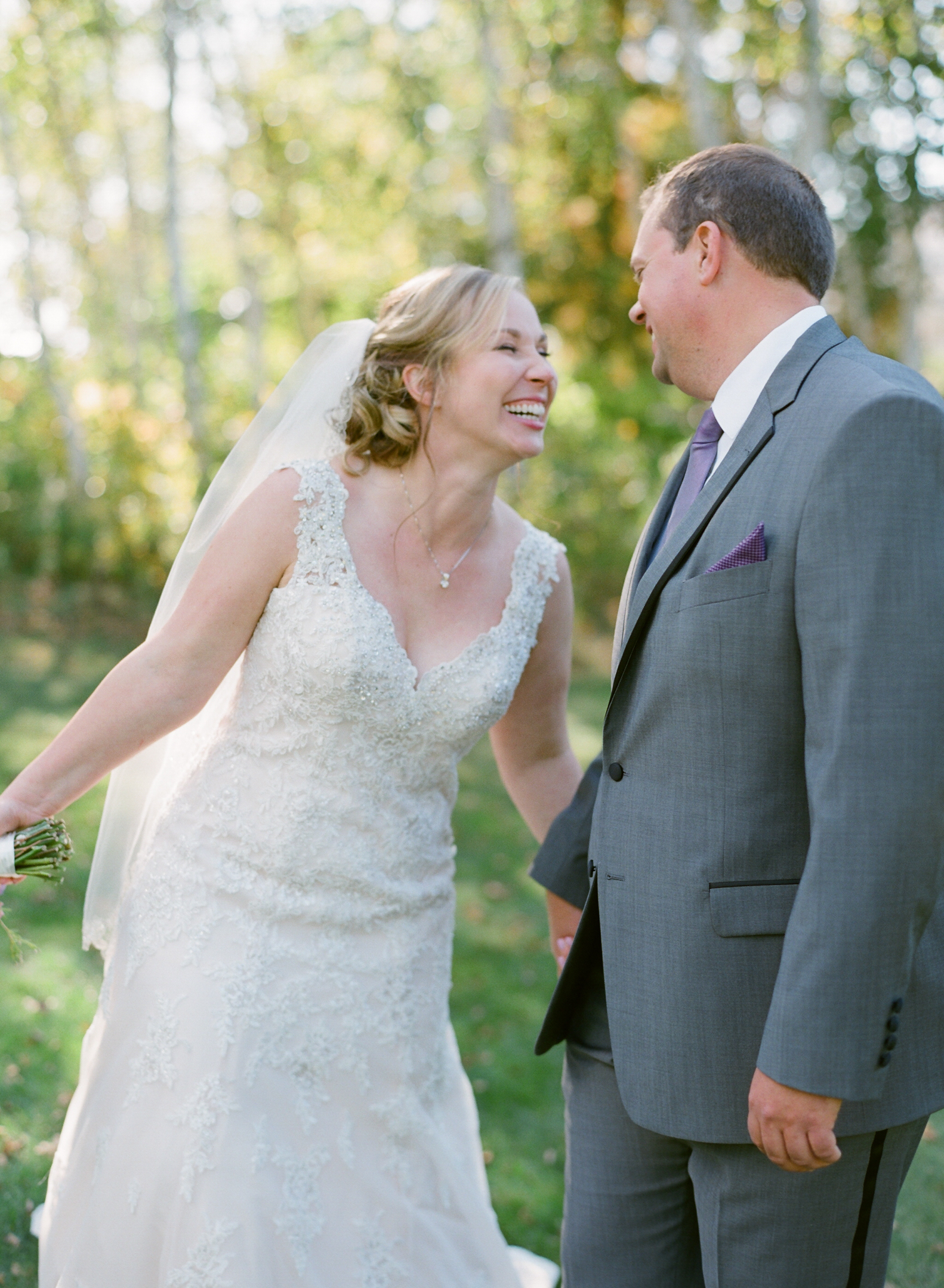 bride and groom laughing at Horseshoe Bay Golf Club wedding reception