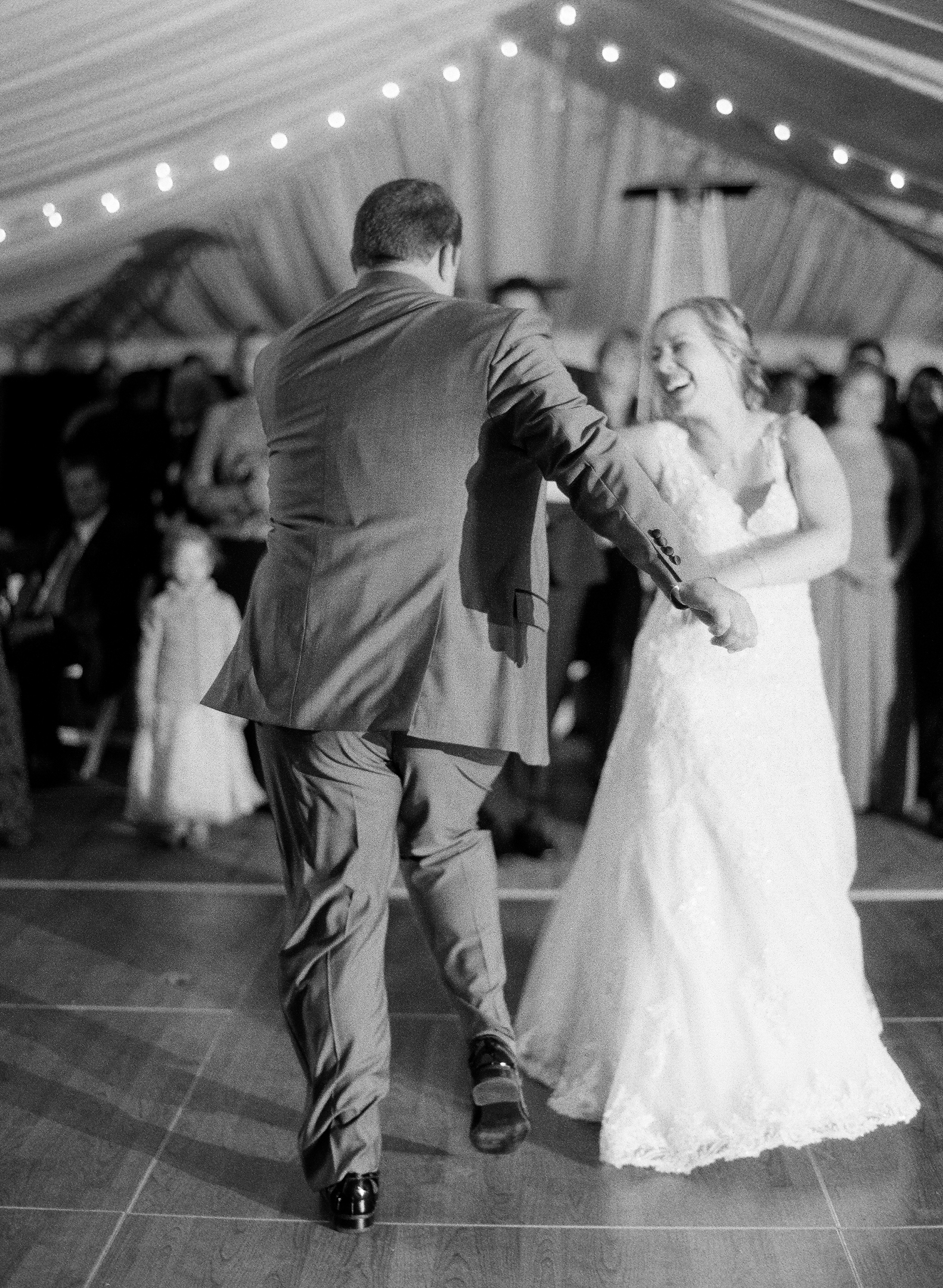 bride and groom's first dance captured on Ilford 3200 black and white film