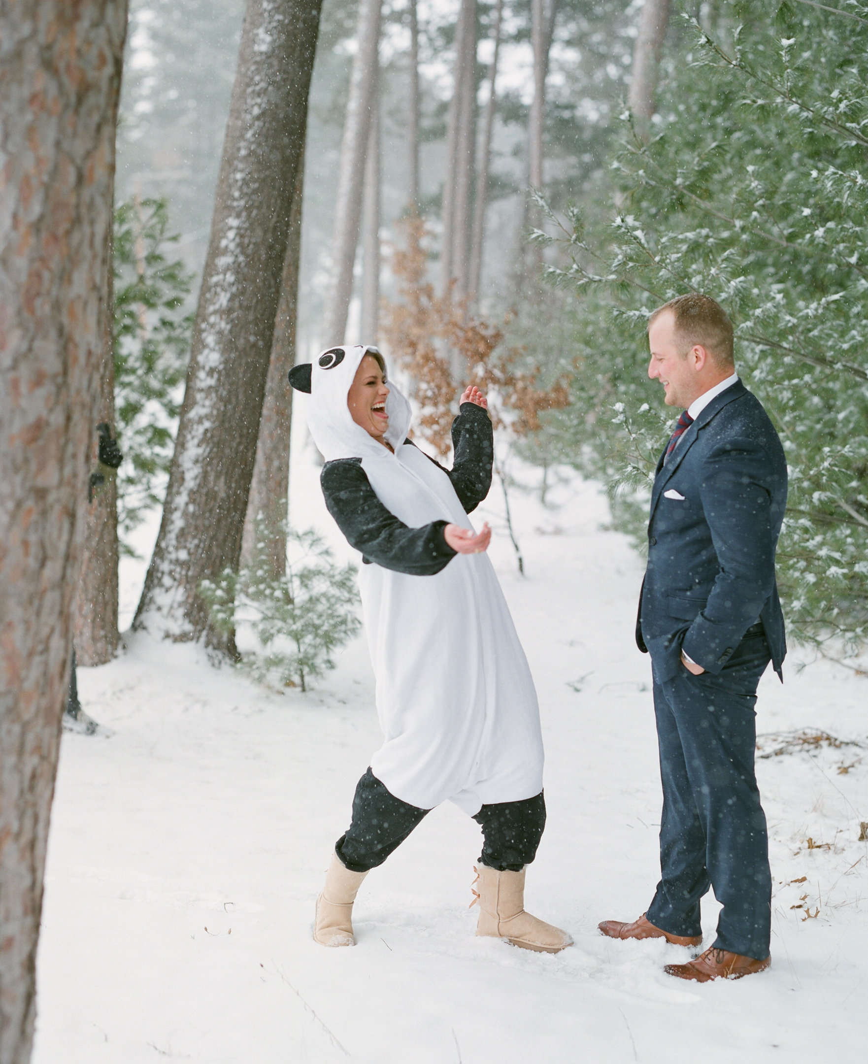 Bride wearing funny costume for first look with groom on her wedding day