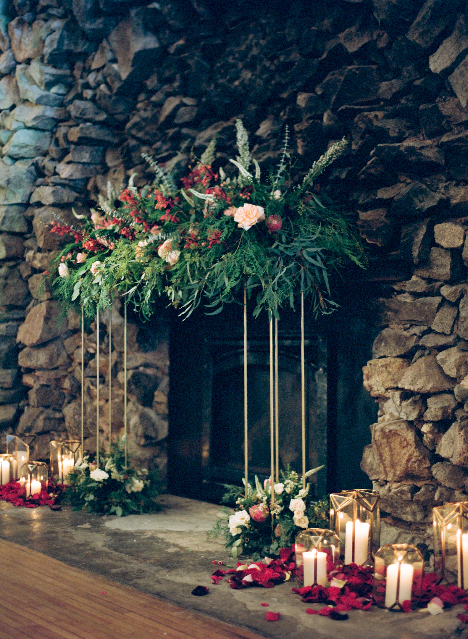 Grand fireplace floral arbor at Rothschild Pavilion winter wedding