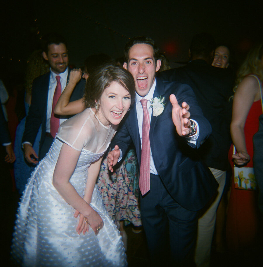 Bride and Groom on the dance floor in a tented door county reception